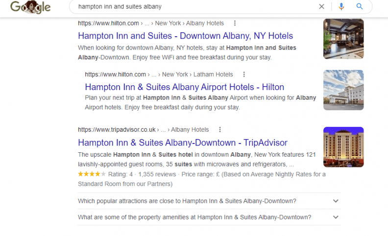 Google search result showcasing a local citation example for Hampton Inn & Suites Albany, featuring hotel details, reviews, and booking options.